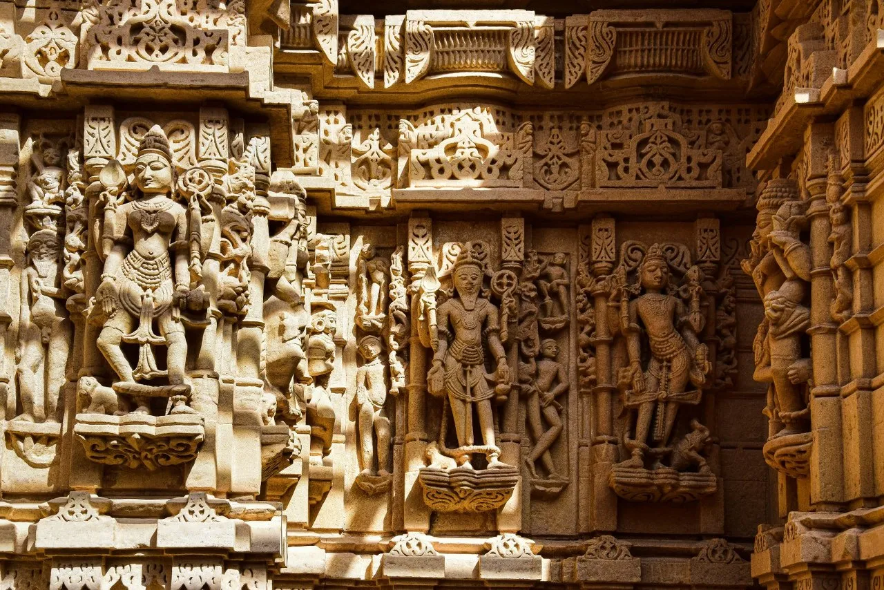 Carved sandstone figures on a Jain temple in Jaisalmer